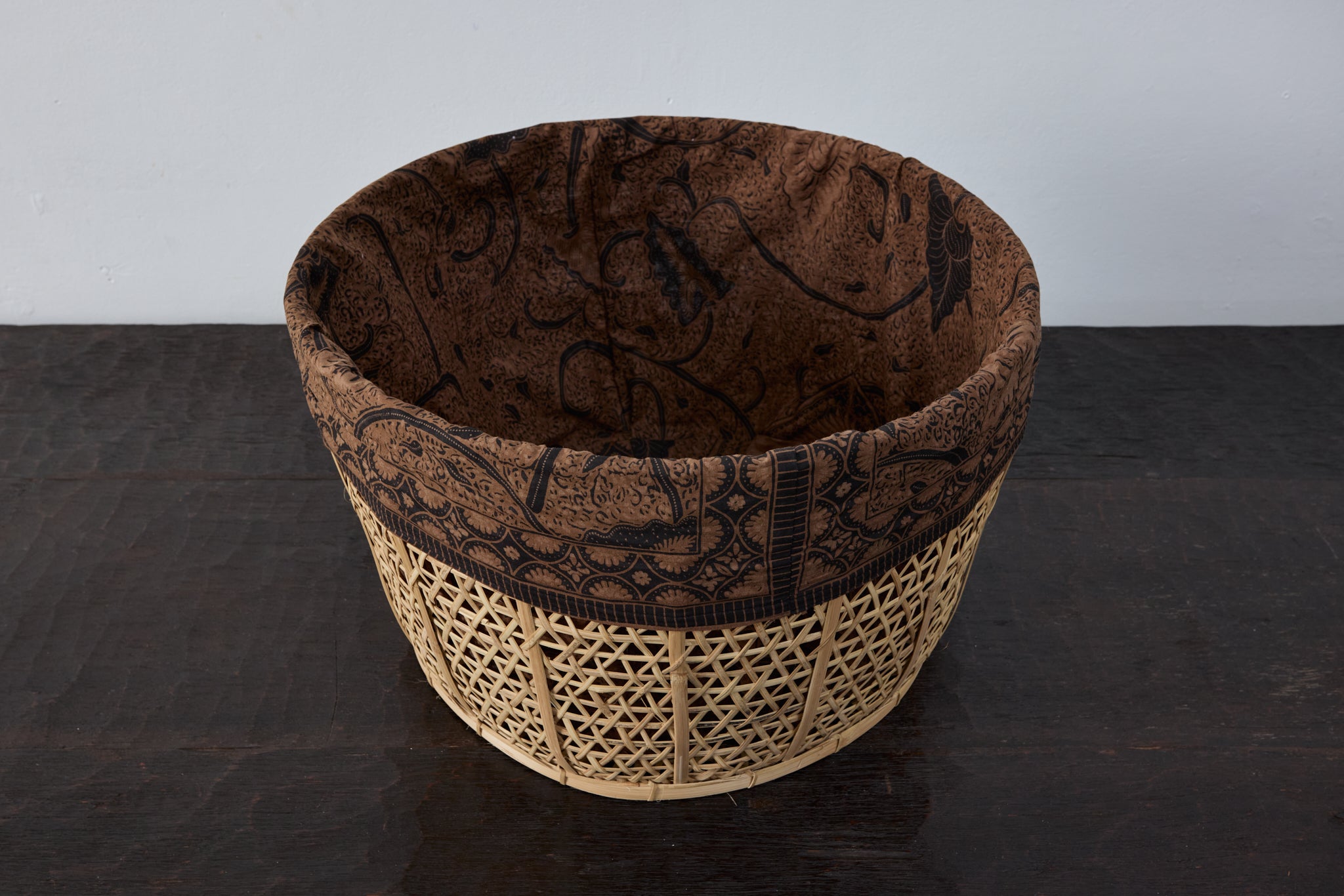 Vintage  wash basket with batik liner